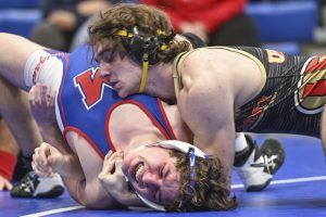 University dominates on the mat against rival Morgantown
